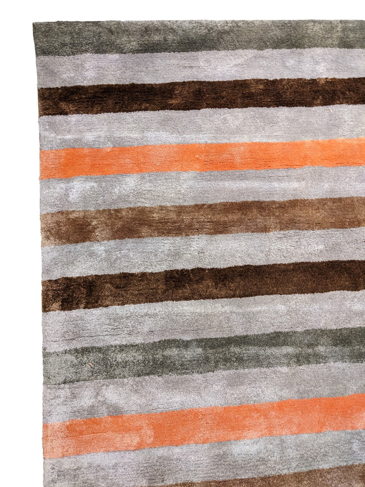 Tani Hand Tufted Rug - Size: 8.10 x 5.10